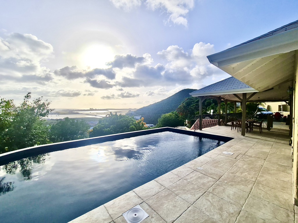 Almond Grove Home w/ Pool and Ocean Views