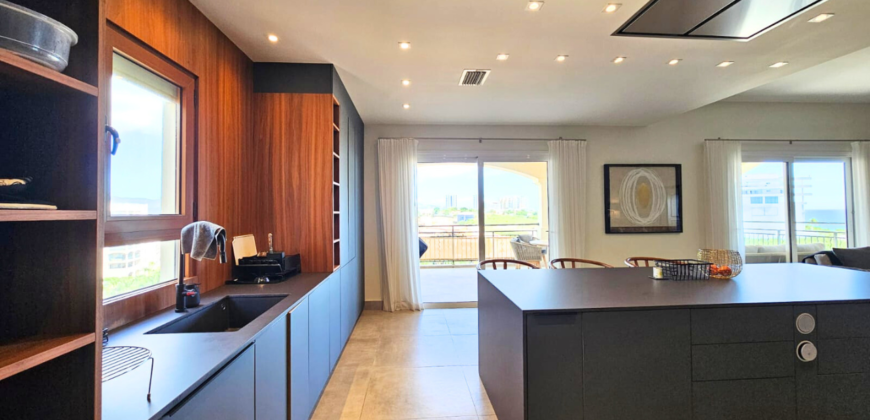 Luxurious 3-Bedroom Condo with Stunning Caribbean Sea Views
