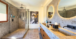 Luxurious 3-Bedroom Condo with Stunning Caribbean Sea Views