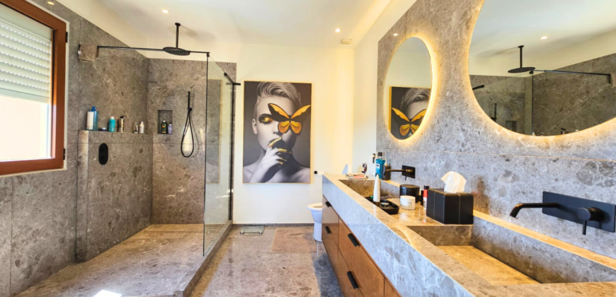 Luxurious 3-Bedroom Condo with Stunning Caribbean Sea Views