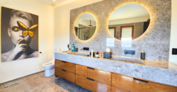 Luxurious 3-Bedroom Condo with Stunning Caribbean Sea Views