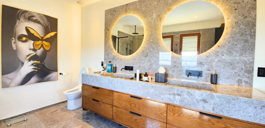 Luxurious 3-Bedroom Condo with Stunning Caribbean Sea Views