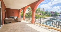 Luxury Living at Porto Cupecoy – Condo with Lagoon Views