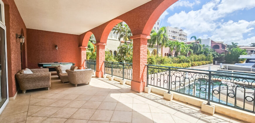 Luxury Living at Porto Cupecoy – Condo with Lagoon Views